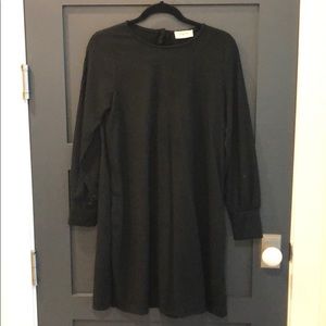 Black knit long sleeve swing mini dress